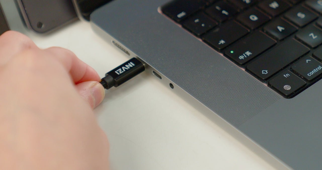 INVZI USB-C cable connecting MagHub Quad Max to a laptop